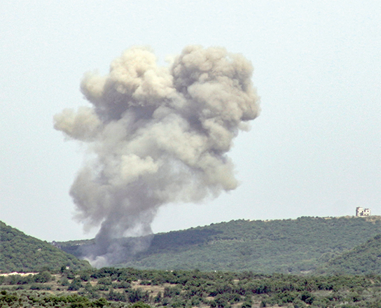 Smoke billows from the site of an Israeli air strike on the outskirts of the southern Lebanese village of Ramiah on Saturday (AFP photo)