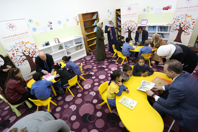 Local, British and US officials speak to students at Al Shaimaa Primary Coeducational School, one of the schools where the Early Grade Reading and Mathematics Initiative is being implemented (Photo courtesy of USAID)
