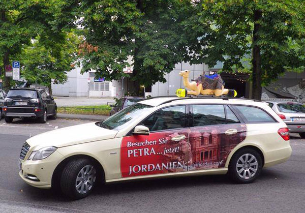 A sign promoting Jordan's tourist attractions is seen on a taxi in Germany recently  (Photo courtesy of Jordan Tourism Board)