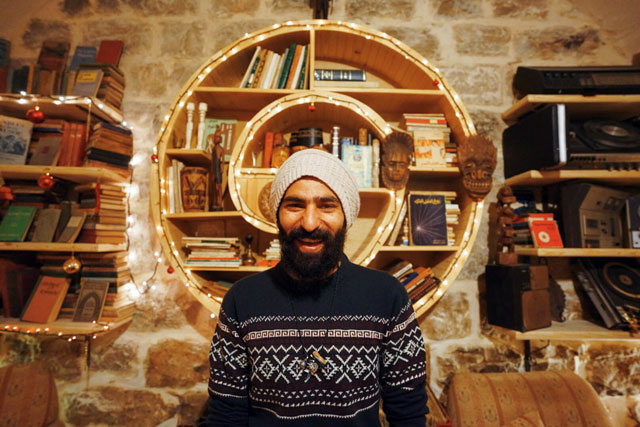   In this photo taken in 2016, the founder of Kawn, Gaith Bahdousheh, is seen at his first bookshop (Photo courtesy of Super Nova)