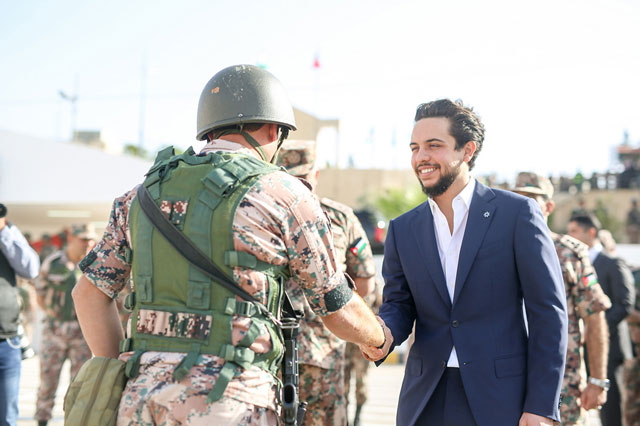HRH Crown Prince Hussein is greeted by a soldier as he arrives to attend a military drill by an army unit on Tuesday (Photo courtesy of Royal Court)