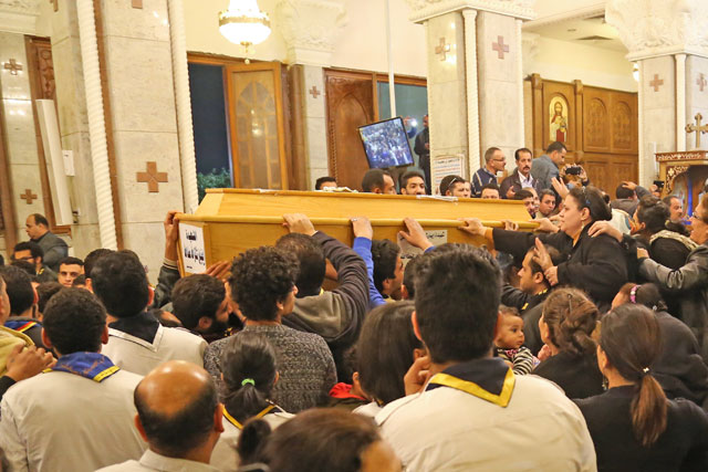 Egyptians gather at Mary Church during the funeral ceremony of the Mar Mina Church attacks victims in Helwan City, south of Cairo, Egypt, on Friday (Anadolu Agency photo)