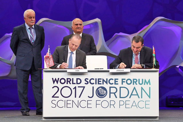 HRH Prince Hassan attends a signing ceremony of a cooperation agreement protocol between Planning Minister Imad Fakhoury and Deputy Charge D’affaires of the US Embassy in Amman Jim Bernhardt at the Dead Sea on Saturday (Photo courtesy of Planning Ministry)
