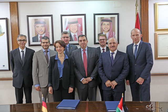Jordanian, French and German officials pose for a group photo after signing loan agreements in Amman on Wednesday (Photo courtesy of Planning Ministry)