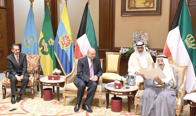 Kuwaiti Emir Sheikh Sabah Al Sabah receives a letter from His Majesty King Abdullah delivered by Senate President Faisal Fayez in Kuwait on Monday (Petra photo)