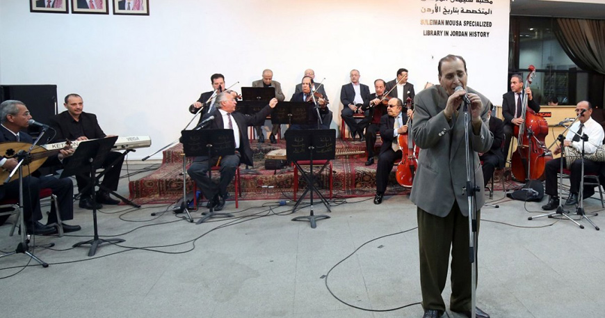 Jordanian singer Mohamed Wahib (third from right) sings with the Beit Al Ruwwad ensemble during a concert at Hussein Cultural Centre in March  (AFP photo)