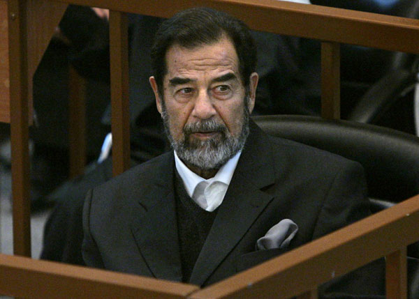 This file photo taken on November 28, 2006 shows ousted Iraqi president Saddam Hussein sitting in court as his trial resumed in Baghdad (AFP photo)