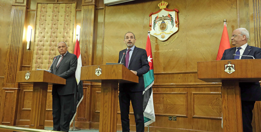 Foreign Minister Ayman Safadi, Egyptian Foreign Minister Sameh Shukri and Saeb Erekat, PLO’s executive committee’s secretary and chief Palestinian negotiator, during a press conference in Amman on Sunday  (Petra photo)
