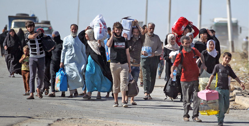 Displaced Iraqis from western Mosul head to Hammam Al Alil camp for internally displaced people after fleeing their homes, as Iraqi forces advance in their ongoing offensive against the Daesh group, on Saturday (AFP photo)