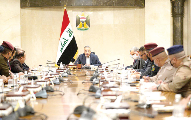 This handout photo, released by Iraq's prime minister's Media office on Sunday, shows Iraqi Prime Minister Mustafa Al Kadhemi heading a meeting, hours after his residence was targeted by a drone attack, in the capital Baghdad (AFP photo/HO/Iraqi Prime Minister's Press Office)