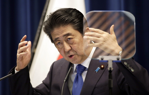 Japanese Prime Minister Shinzo Abe speaks during a press conference at the prime minister's official residence in Tokyo on Wednesday (AP photo)