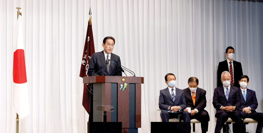 Japan's Prime Minister and ruling Liberal Democratic Party (LDP) leader Fumio Kishida (centre) attends a news conference at the party's headquarters in Tokyo on Monday (AFP photo)