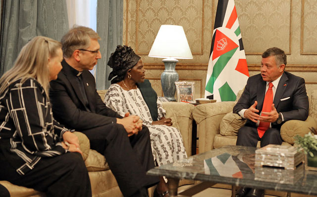 His Majesty King Abdullah receives a delegation from the World Council of Churches in Amman on Wednesday (Photo courtesy of Royal Court)