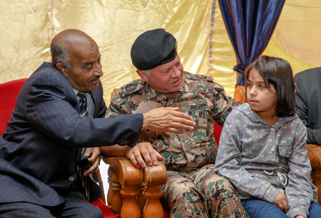 His Majesty King Abdullah visits the family of fallen Gendarmerie officer Ahmad Zu’bi in Ramtha on Sunday (Photo courtesy of Royal Court)