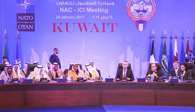 NATO Secretary General Jens Stoltenberg (3rd right) speaks during the North Atlantic Council — Istanbul Cooperation Initiative (ICI) meeting after opening ceremony of NATO-ICI regional centre in Kuwait on Tuesday (Anadolu Agency photo)