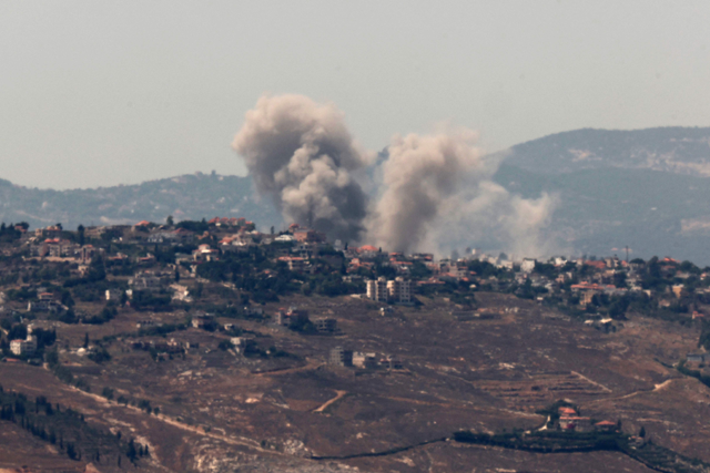 This photo taken from northern Israel shows smoke billowing during Israeli bombardment of southern Lebanon on Tuesday, amid ongoing cross-border clashes between Israeli troops and Hizbollah fighters (AFP photo)