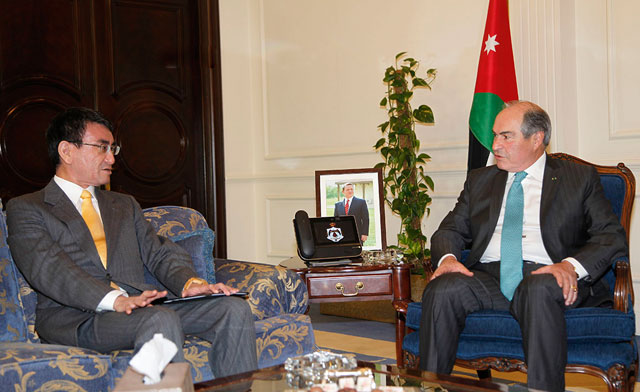 Prime Minister Hani Mulki meets with Japan’s Foreign Minister Taro Kono in Amman on Tuesday (Petra photo)