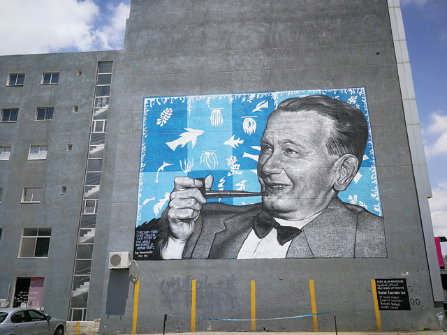 Former UN secretary general Dag Hammarskjold is portrayed on a wall in Amman’s Sweifieh neighbourhood  (Photo by Camille Dupire)