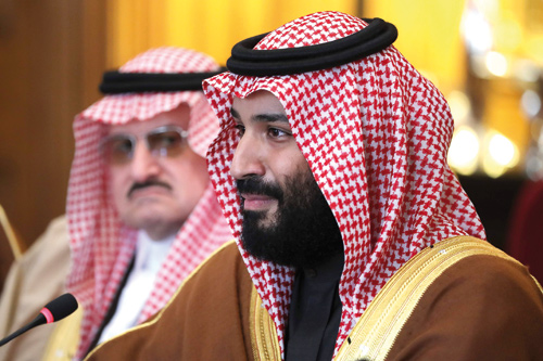 In this file photo taken on March 7 Saudi Arabia's Crown Prince Mohammed Bin Salman (right) gestures during a meeting with Britain's Prime Minister Theresa May (unseen) and other members of the British government and Saudi ministers and delegates at number 10 Downing Street, in central London (AFP photo)