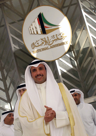 Kuwaiti National Assembly speaker Marzouq Al Ghanim leaves the assembly building in Kuwait City on Sunday (AFP photo)