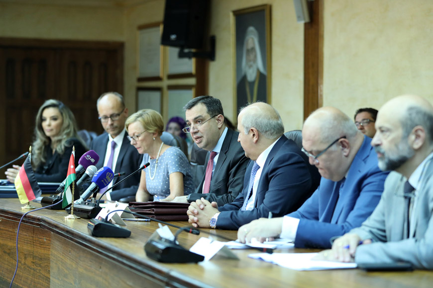 Minister of Planning and International Cooperation Imad Fakhoury and Germany’s Ambassador to Jordan Birgitta Maria Siefker-Eberle sign several agreements in Amman on Monday (Photo courtesy of Planning Ministry)