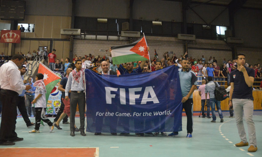 Jordanian youth gather Friday at Al Hussein Sports City to follow  FIFA election (Photo by Muath Freij)