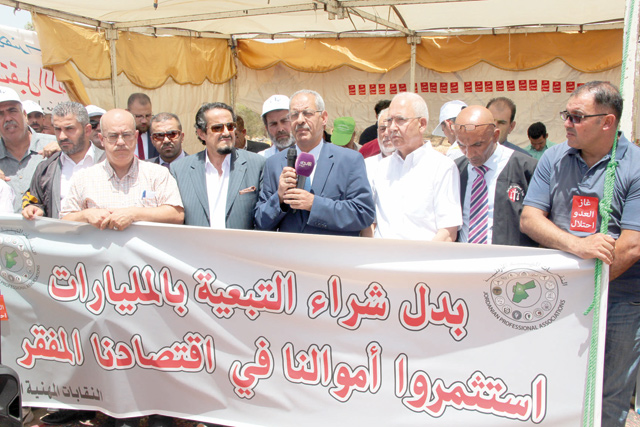 Protesters are seen denouncing the ongoing construction work on the Israeli pipeline in Irbid on Wednesday (Photo courtesy of Professional Associations Council)