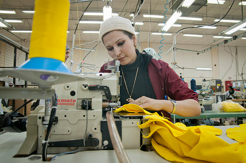An unidentified worker is seen  at a QIZ factory in this undated photo (Photo courtesy of Better Work, ILO/IFC)