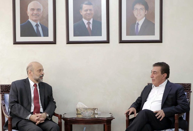 Prime Minister-designate Omar Razzaz meets with Lower House Speaker Atef Tarawneh in Amman on Thursday (Petra photo)