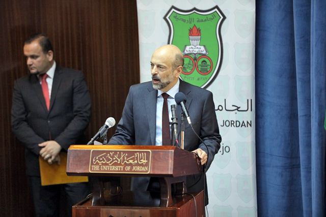 Prime Minister Omar Razzaz delivers a lecture at the University of Jordan on Sunday (Photo by Nader Daoud)