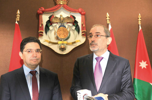 Foreign Minister Ayman Safadi (right) meets with his Moroccan counterpart Nasser Bourita in Amman on Wednesday (Petra photo)