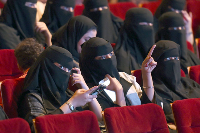 Saudi women attend the ‘Short Film Competition 2’ festival on Friday, at King Fahd Cultural Centre in Riyadh (AFP photo)