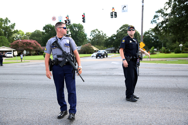 Police officers block off a road near the site of a shooting of police in Baton Rouge, Louisiana, United States,  on Sunday (Reuters photo)