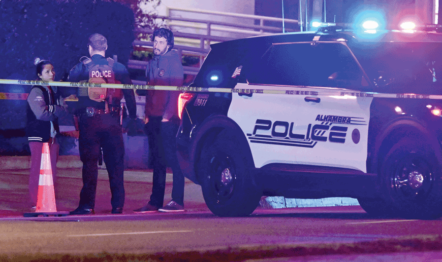 Police patrol the scene along Garvey Avenue in Monterey Park, California, on Saturday, where police are responding to reports of multiple people shot (AFP photo)