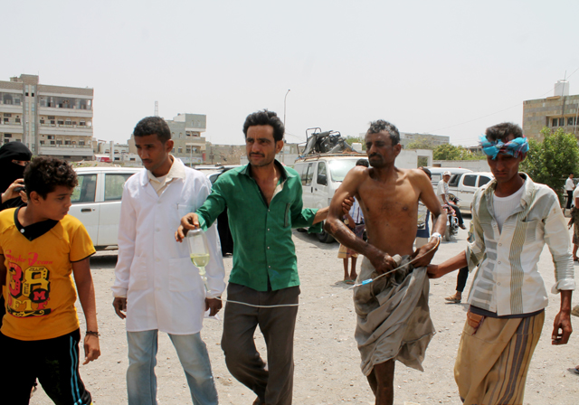 An injured man is being taken to a nearest hospital in Al Hudaydah, Yemen, on Wednesday (Anadolu Agency photo)