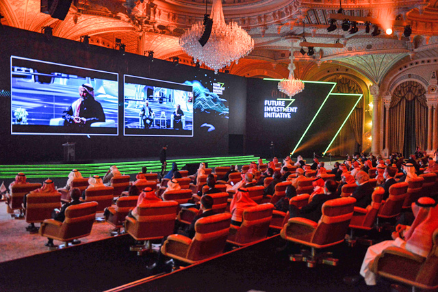 Delegates attend a debate during the fourth edition of the Future Investment Initiative (FII) conference at the capital Riyadh's Ritz-Carlton Hotel on Wednesday (AFP photo)