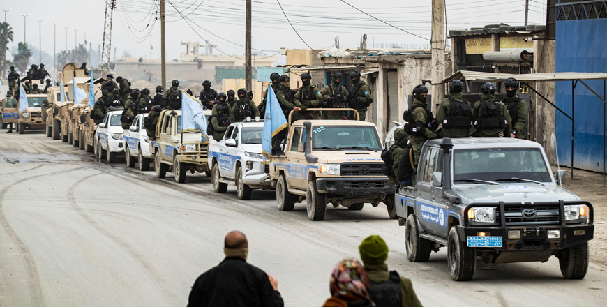 Syrian Kurdish Asayish security forces deploy during a raid against suspected Daesh extremists in Raqqa, the terror group's former defacto capital in Syria, on Sunday (AFP photo)