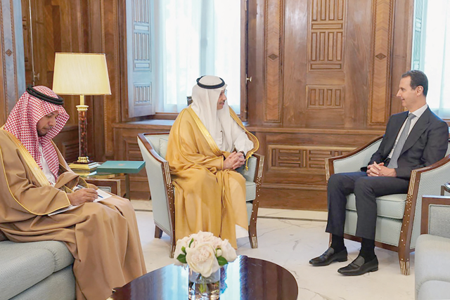 This handout photo released by the Syrian Presidency Telegram account on Wednesday shows Syrian President Bashar Assad meeting with Saudi's ambassador to Jordan, Nayef Bin Bandar Al Sudairy, in Damascus (AFP photo)