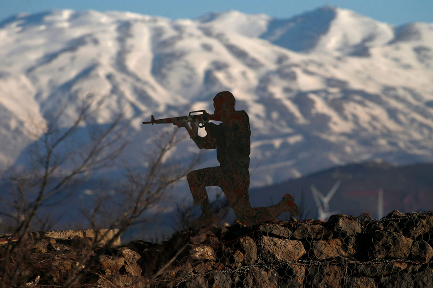 A metal cutout of an Israeli soldier at an army post in Mount Bental near the Syrian border in the occupied Golan Heights on Wednesday (AFP photo)