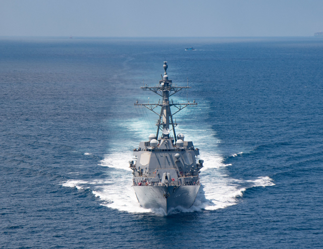 In this file handout image courtesy of the US Navy taken on August 27, 2021, the AI Arleigh-burke class guided-missile destroyer USS Kidd (DDG 100) transits the Taiwan Strait during a routine transit (AFP photo)