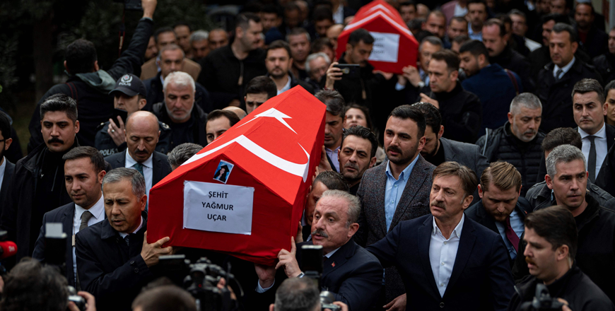 People carry coffins of Yagmur Ucar and Arzu Ozsoy during funeral ceremonies of people who lost their lives after the explosion on Istiklal Street, in Istanbul on Monday (AFP photo)