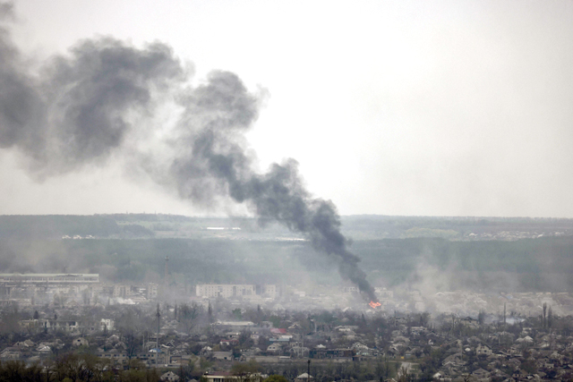 A photograph, taken from Novodruzhesk village, shows dark smoke rising in Rubizhne city, on Monday, on the 54th day of the Russian invasion of Ukraine (AFP photo)