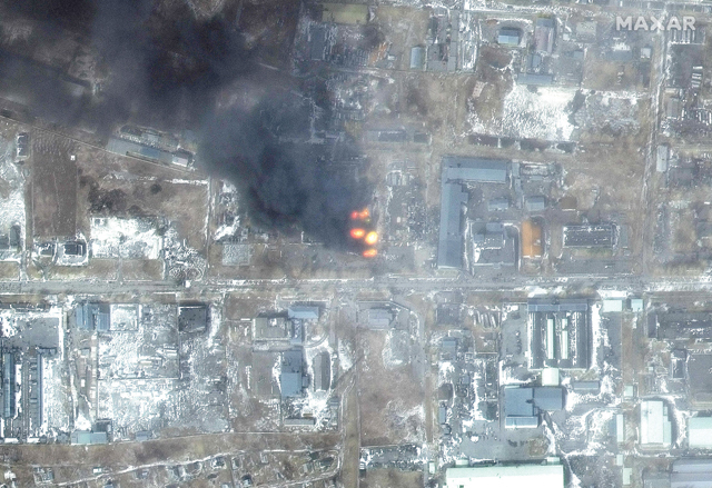 This Maxar satellite image, taken and released on Saturday, shows a multispectral view of fires in an industrial area of the Primorskyi district in western Mariupol, Ukraine (AFP photo)