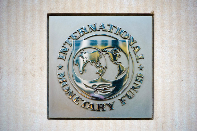 In this file photo, the seal of the International Monetary Fund (IMF) is seen outside of a headquarters building in Washington, DC on April 7 (AFP photo)