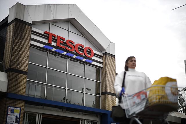 Signage is seen outside a Tesco Superstore in south London on September 30, 2019. (AFP photo)