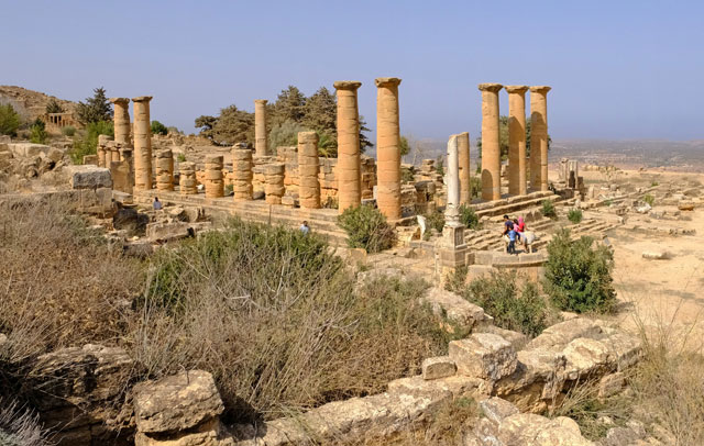Tourists visit the ancient ruins of the Greek and Roman city of Cyrene in Shahhat, Libya, on Saturday (Reuters photo)