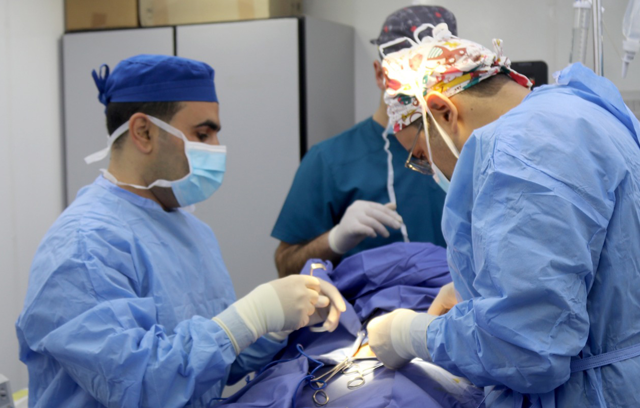 A specialised medical team at the Jordanian field hospital Nablus 2 on Monday performs surgeries  (Petra photo)