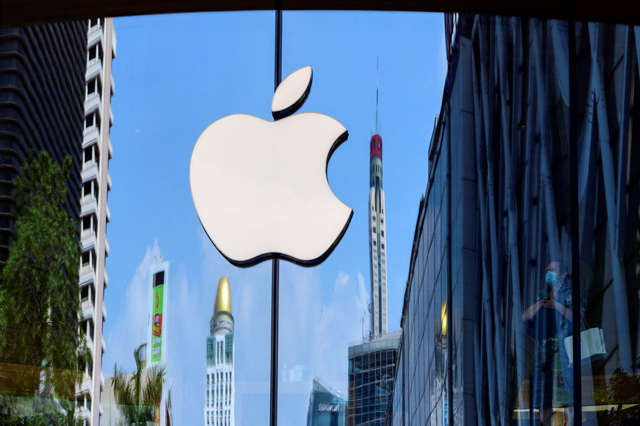 The Apple logo is seen on a window of the company's store in Bangkok, on Friday (AFP photo)