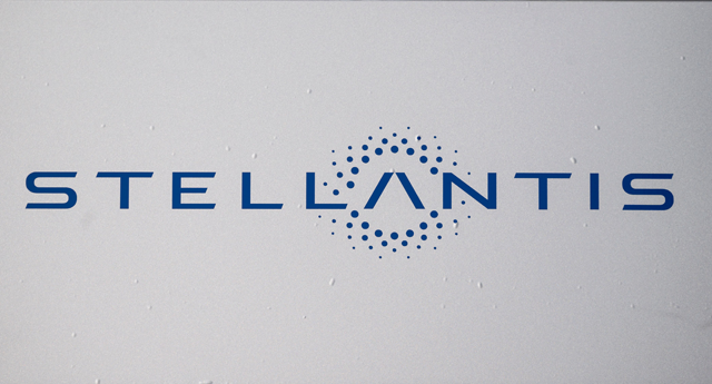 A picture taken on January 19, 2021 shows the logo of Stellantis, the company forged in mega-merger of Fiat and Peugeot, after it was added on the facade of the Fiat Mirafiori car plant in Turin, northern Italy (AFP photo)
