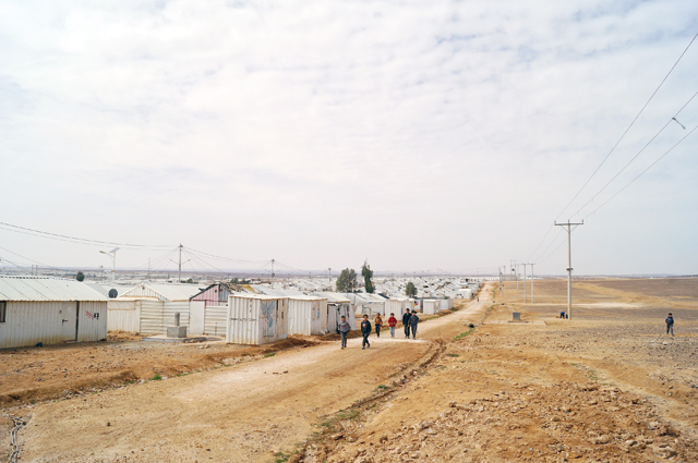 Syrian refugees are seen in the Azraq camp around 100km from Amman, in the Eastern Desert (Photo by Hanna Davis)